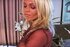 Stunning blonde chick smoking a cigarette with joy