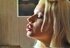 Lovely blonde babe loves to smoke a lot at home