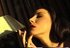 Sensual dark haired lady loves to smoke and to show off