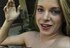 Blonde hottie spreads her legs outdoors and smokes