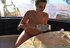 Sexy babe with nice tits likes to smoke outdoors