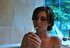 Babe with huge tits smokes in the bathtub