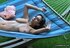 Bitch with large tits enjoys a cigarette outdoors