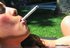 Super nasty bitch teasing her cunt and smoking outdoors