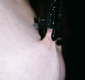 Tied up raven haired slut gets her nipples teased