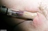 Bound and gagged bitch gets her nice vagina waxed