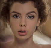 Foxy babe pose her indulging body and seduces with her big round tits