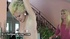 Blonde with oiled natural tits spanked by lady's whip
