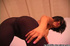 brunette with pink-nailed fingers
