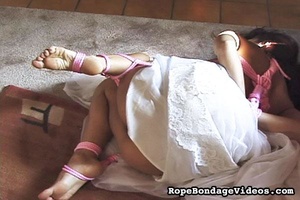Lady in a wedding dress gets gagged and  - Picture 13