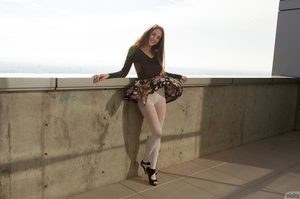 Brunette teen posing in white pantyhose  - Picture 6
