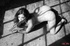 Smokey eyed hottie in white lace bra strips off panties and digs sex toy