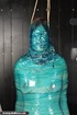 Kinky hottie gets tied up and wrapped in plastic