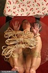 Lady gets tied in ropes and drilled with a dildo