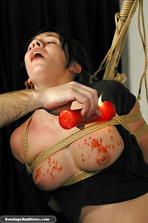 Tied up brunette gets a really painful w - Picture 11