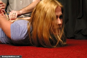 Super cute blonde gal gets hogtied by he - Picture 2