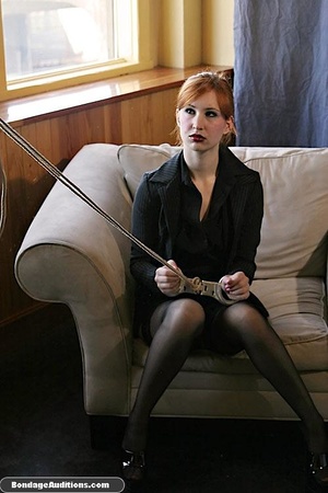 Terrific redhead in stockings gets her p - Picture 2