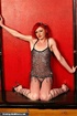 Redhead hottie gets tied and sucks a black dildo