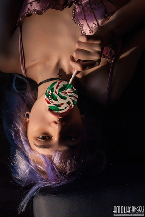 Naughty purple haired teen gal licks a nice lollipop - Picture 8