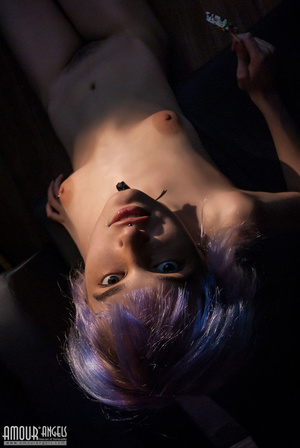 Naughty purple haired teen gal licks a nice lollipop - Picture 13