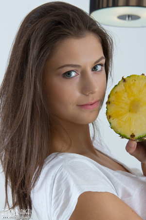 Beautiful teen model posing with a sliced pineapple - XXXonXXX - Pic 2