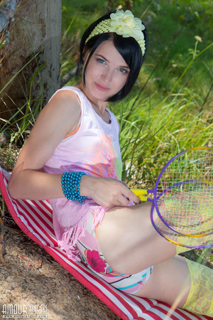Young tennis girl having naughty fun outdoors - Picture 5