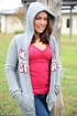 Seductive chick takes off her gray hooded jacket then lifts up her purple