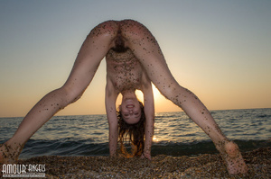 Young gal with a hairy cunt gets dirty on the beach - XXXonXXX - Pic 11