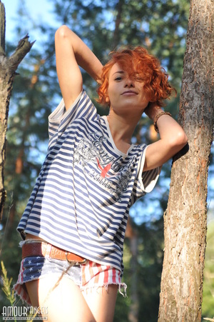 Marvelous redhead chick posing in the woods - XXXonXXX - Pic 4