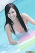 Gorgeous chick gets her stunning body wet in the pool wearing her sexy