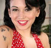 Cute hottie with red headband and nose piercing takes off her mini red