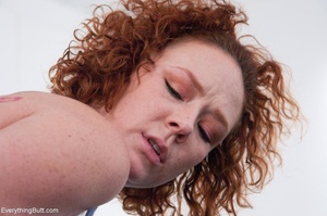 Curly haired redhead with a pretty face  - Picture 15