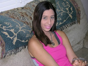 Sweet hottie displays her skinny body in pink shirt and red shorts then slowly strips them off and expose her petite boobs and indulging pussy in different poses on a gray couch, blue bed and wooden chest. - XXXonXXX - Pic 1