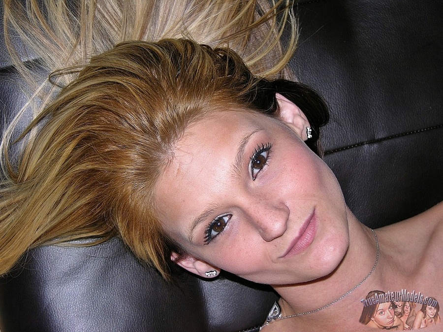 Gorgeous chick with smoking hot body peels off her red shirt and expose her juicy boobs before she pulls down her jeans shorts and pink panty and reveals her lusty crack in different poses on a black couch and on a white bed. - XXXonXXX - Pic 6