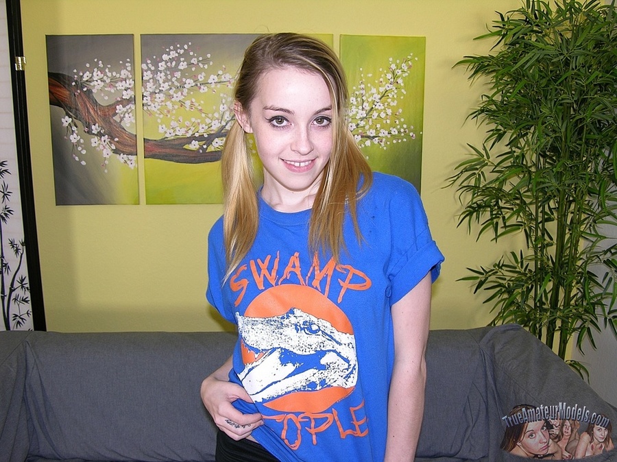 Sweet chick displays her foxy body on a gray couch wearing blue shirt, black pants and white socks before she takes them off and reveals her skinny body with petite tits and indulging pussy in different positions on a black couch and black and white bed then grabs her boyfriend's dick and jacks it hard. - XXXonXXX - Pic 3