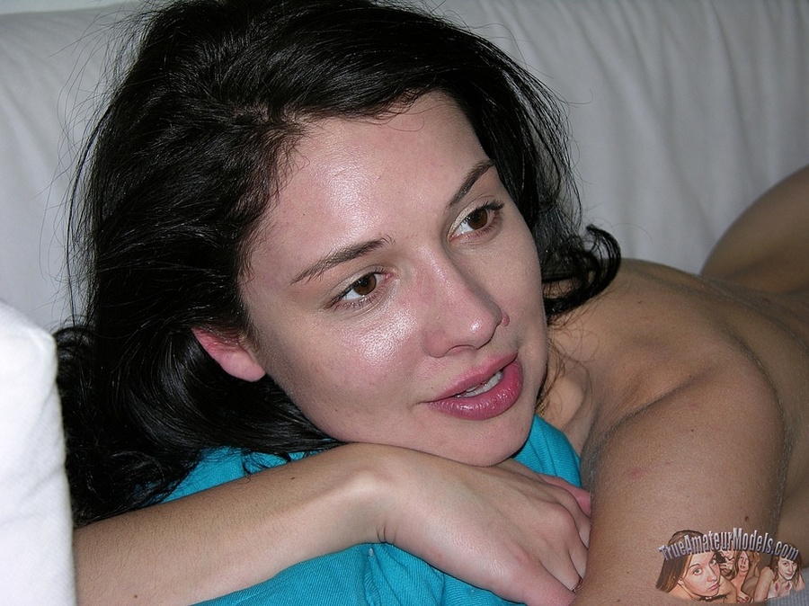 Gorgeous chick seduces with her steaming hot body in multi-colored bikini while she lays on a black beach bed by a pool before she goes inside then gets naked and reveals her petite tits and ravishing pussy in different poses on a white couch and purple and white polka dotted bed. - XXXonXXX - Pic 12