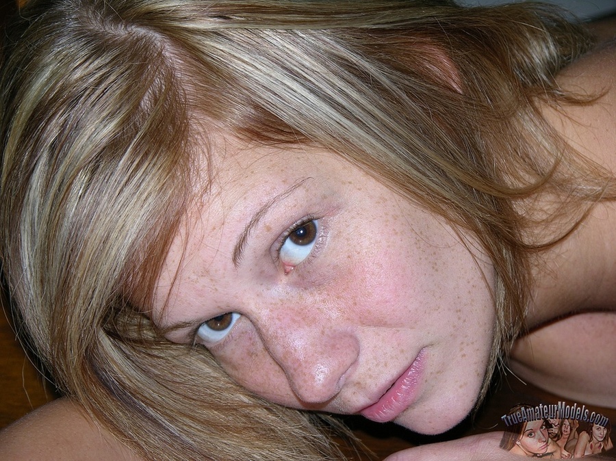 Freckeled chick slowly peels off her white blouse, pink shirt and jeans shorts then expose her stunning body with perfect tits and juicy pussy in different positions on a gray couch and a brown bed. - XXXonXXX - Pic 10