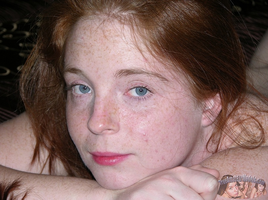 Cute redhead peels off her gray see through blouse and black bra and shows her big juggs then strips down her jeans and black panty and reveals her hot crack as she pose naked on a gray couch, brown bed and white tub. - XXXonXXX - Pic 10