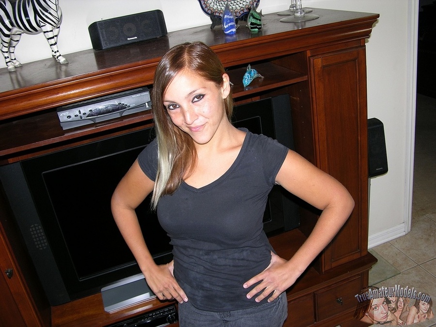 Smoking hot babe displays her banging body wearing black shirt, jeans and underwear before she strips them off piece by piece and bares her lusty boobs with big nipples and stimulating pussy in different poses on a brown bed, gray couch and white tub. - XXXonXXX - Pic 1