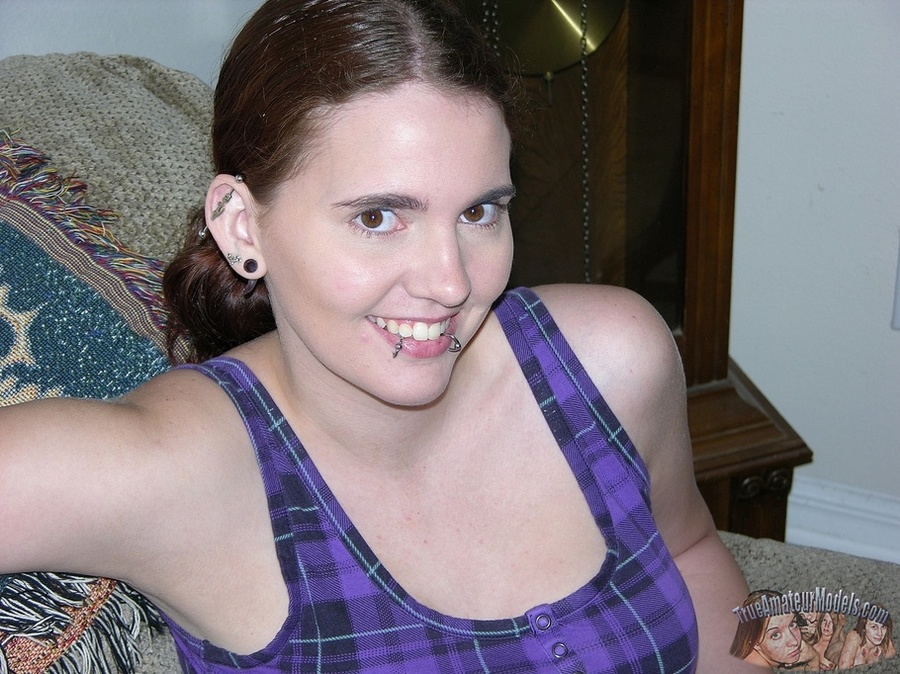 Teen cutie with lip piercings slowly peels down her jeans skirt and black panty and teases with her indulging pussy then takes off her violet and black checkered shirt and reveals her juicy boobs as she pose naked on a gray couch, brown stairway, gray bed and white tub. - XXXonXXX - Pic 4