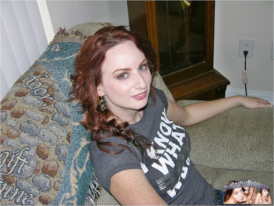 Beautiful brunette sits on a gray couch then takes off her gray shirt and displays her banging body before she peels off her black bra and reveals her indulging tits then strips down her jeans and bares her erotic pussy as she pose naked in different parts of her house. - XXXonXXX - Pic 2