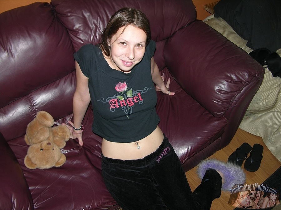 Foxy babe with stunning body takes off her black shirt and bares her petite boobs then strips down her black pants and reveals her lusty crack on a brown couch and different beds. - XXXonXXX - Pic 2