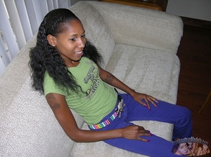 Smoking hot ebony strips off her green shirt and violet pants then seduces with her banging body with small tits and juicy pussy in different poses on a gray couch, wooden chair and white bed. - XXXonXXX - Pic 2
