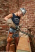 Powered dildo makes happy babe at a construction site
