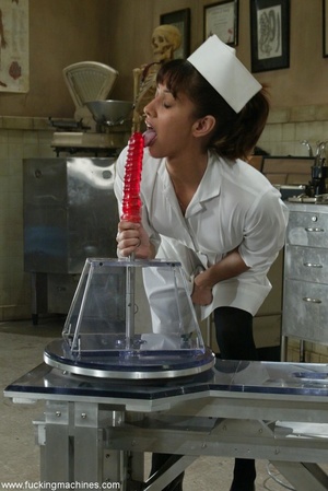 Lovely doctor got horny with mechanized dildos at work - Picture 1