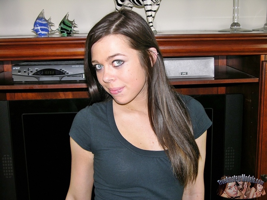 Gorgeous teen pose her foxy body in black shirt, black and white checkered shorts and shoes before she shows her lusty butt while she gets naked then reveals her small tits and erotic pussy in different poses on a gray bed. - XXXonXXX - Pic 1