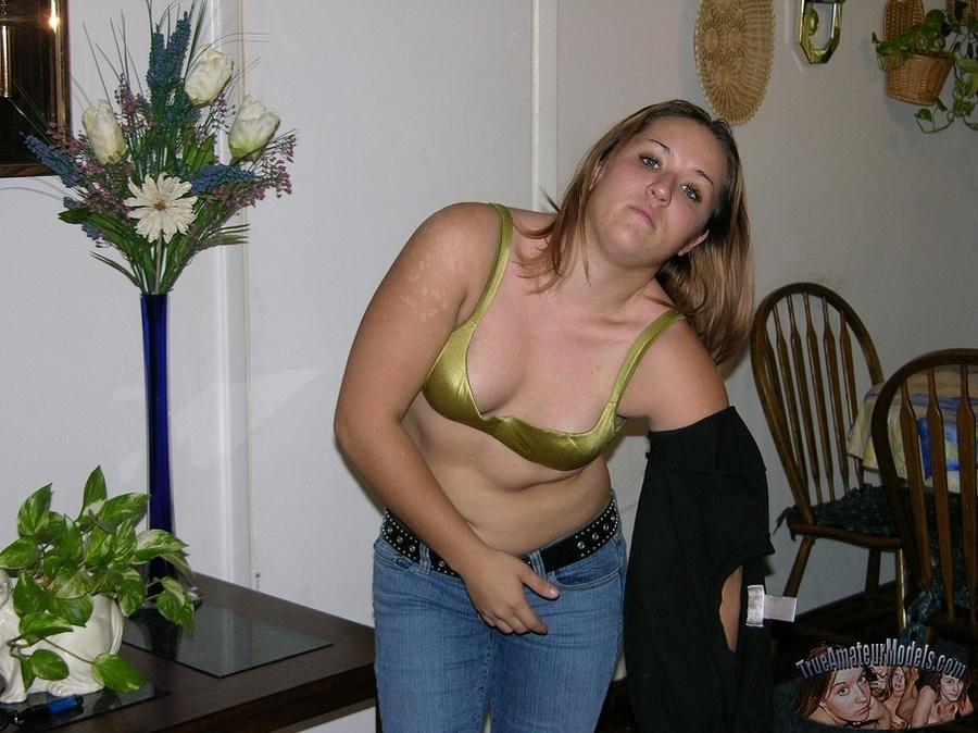 Hot young brunette takes off her black shirt and pose her banging body wearing her gold bra and jeans before she gets naked and reveals her luscious tits and pussy in different positions on a gray couch and brown bed then lets her man lick her crack and spray his cum on her sexy booty. - XXXonXXX - Pic 3