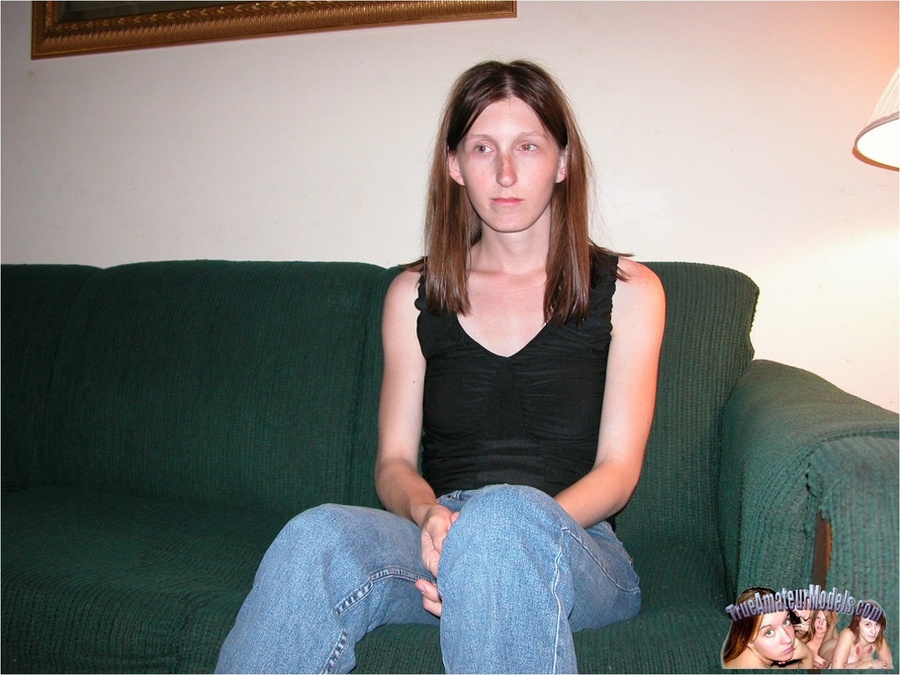 Skinny brunette wearing black blouse, jeans and red bra slowly gets naked and expose her juicy tits and as she lays down on a brown couch before she spreads her legs wide and fingers her twat on a multi-colored floral bed. - XXXonXXX - Pic 2