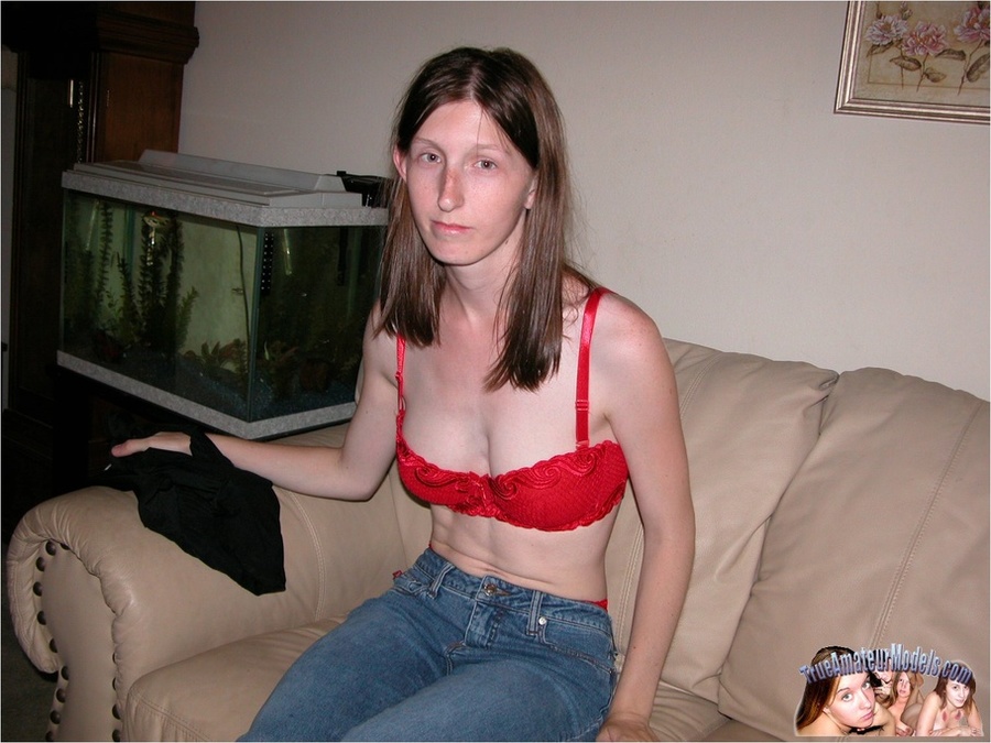 Skinny brunette wearing black blouse, jeans and red bra slowly gets naked and expose her juicy tits and as she lays down on a brown couch before she spreads her legs wide and fingers her twat on a multi-colored floral bed. - XXXonXXX - Pic 3