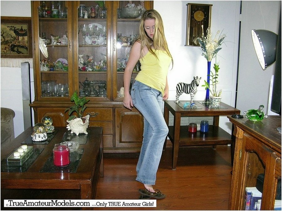 Smoking hot blonde with banging body strips off her yellow shirt, jeans and pink panty piece by piece then shows her lusty breasts and stimulating pussy in different poses on different beds and couches. - XXXonXXX - Pic 3